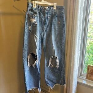 Distressed Blue Jeans